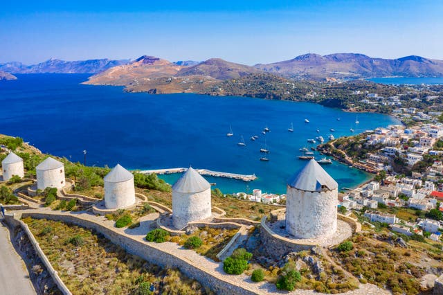 <p>The windmills of Leros sit overlooking the village of Agia Marina</p>