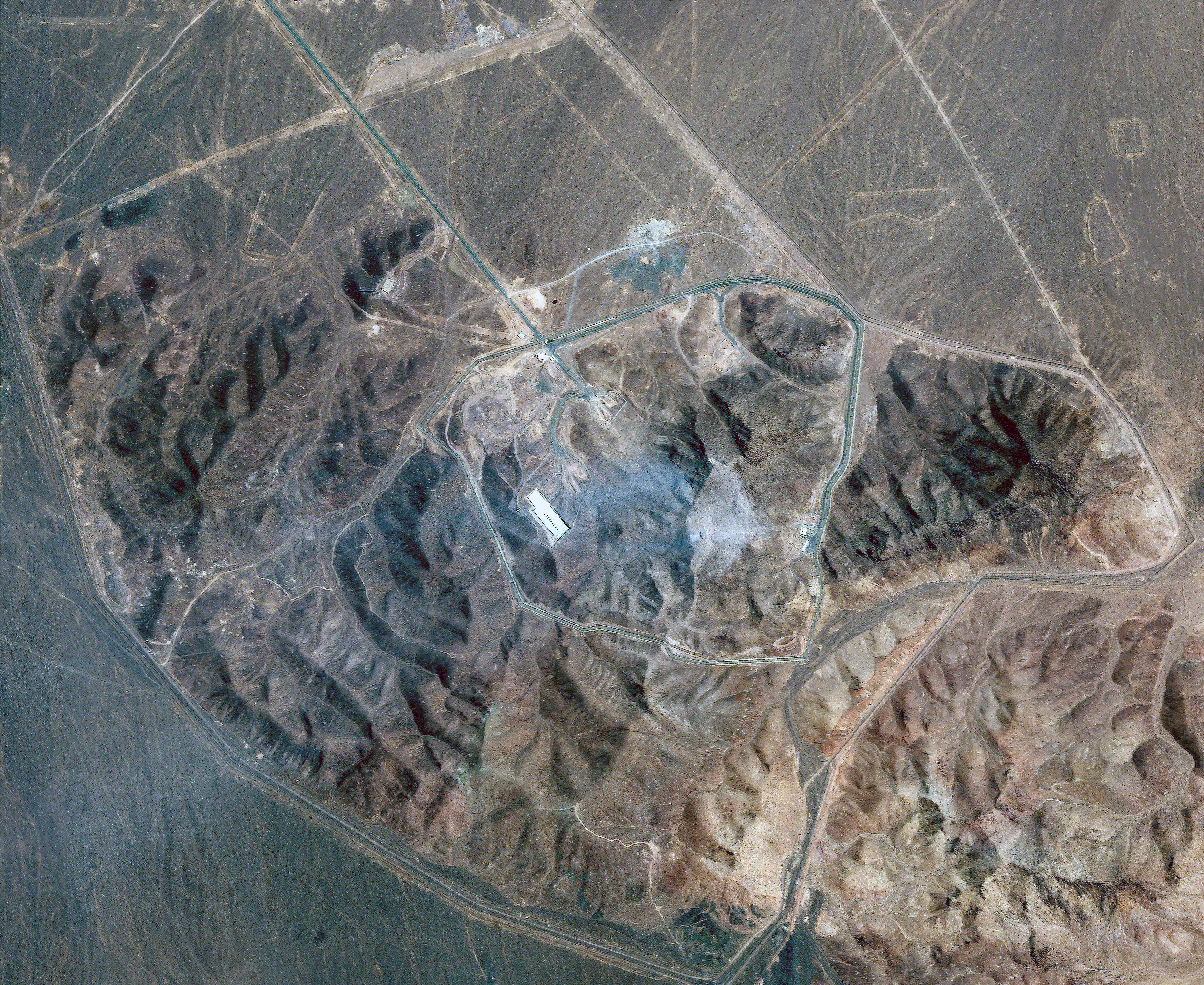 This satellite picture by Planet Labs PBC on 22 June 2025 shows Iran's underground nuclear enrichment site at Fordo following US airstrikes targeting the facility