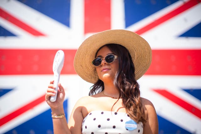 Demand for mini-fans is increasing (James Manning/PA)