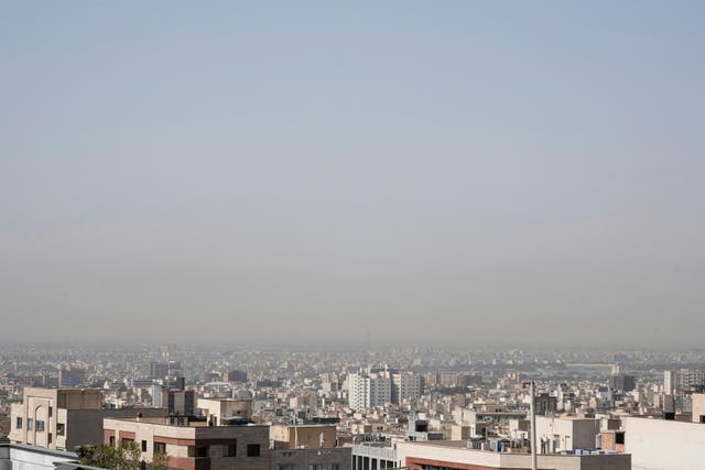 The Tehran skyline on Tuesday morning as the ceasefire went into effect (Vahid Salemi/AP)