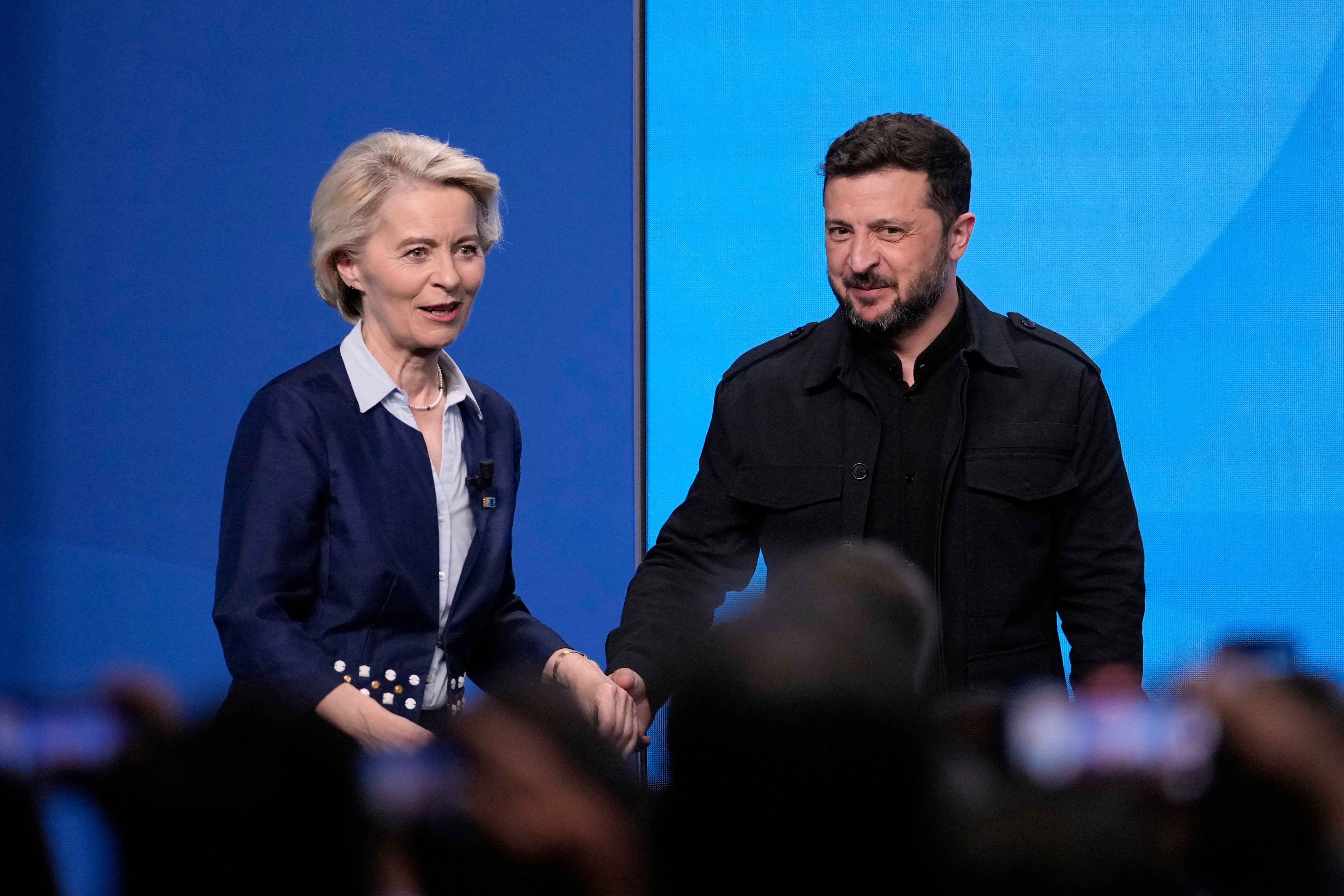 European Commission President Ursula von der Leyen, left, greets Ukraine's President Volodymyr Zelensky