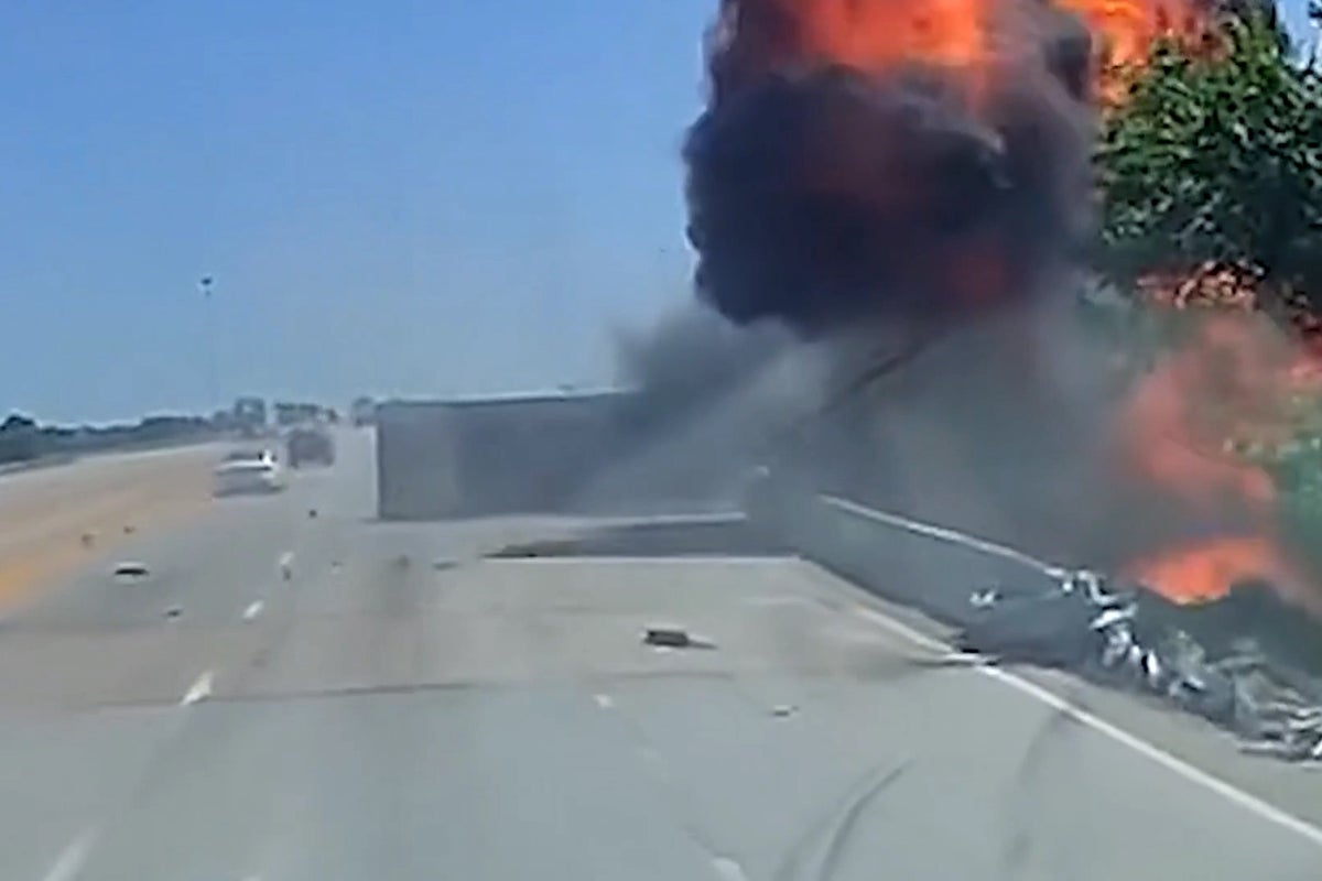 Dramatic moment semi-truck explodes after being struck by swerving driver - but, miraculously, no one was seriously injured