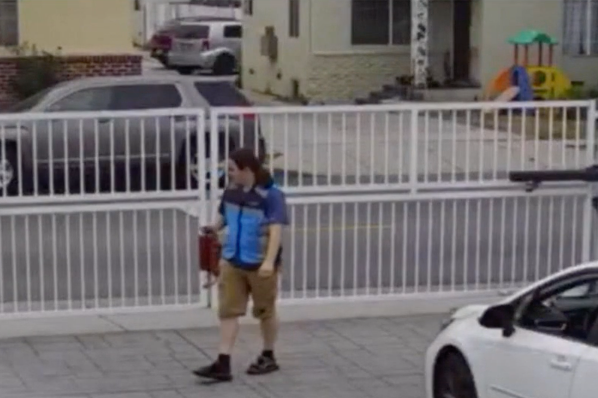 Amazon driver’s racist tirade caught on camera after he’s locked into apartment complex