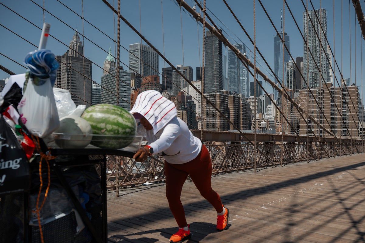 Photos of Americans seeking relief from record-breaking heat wave