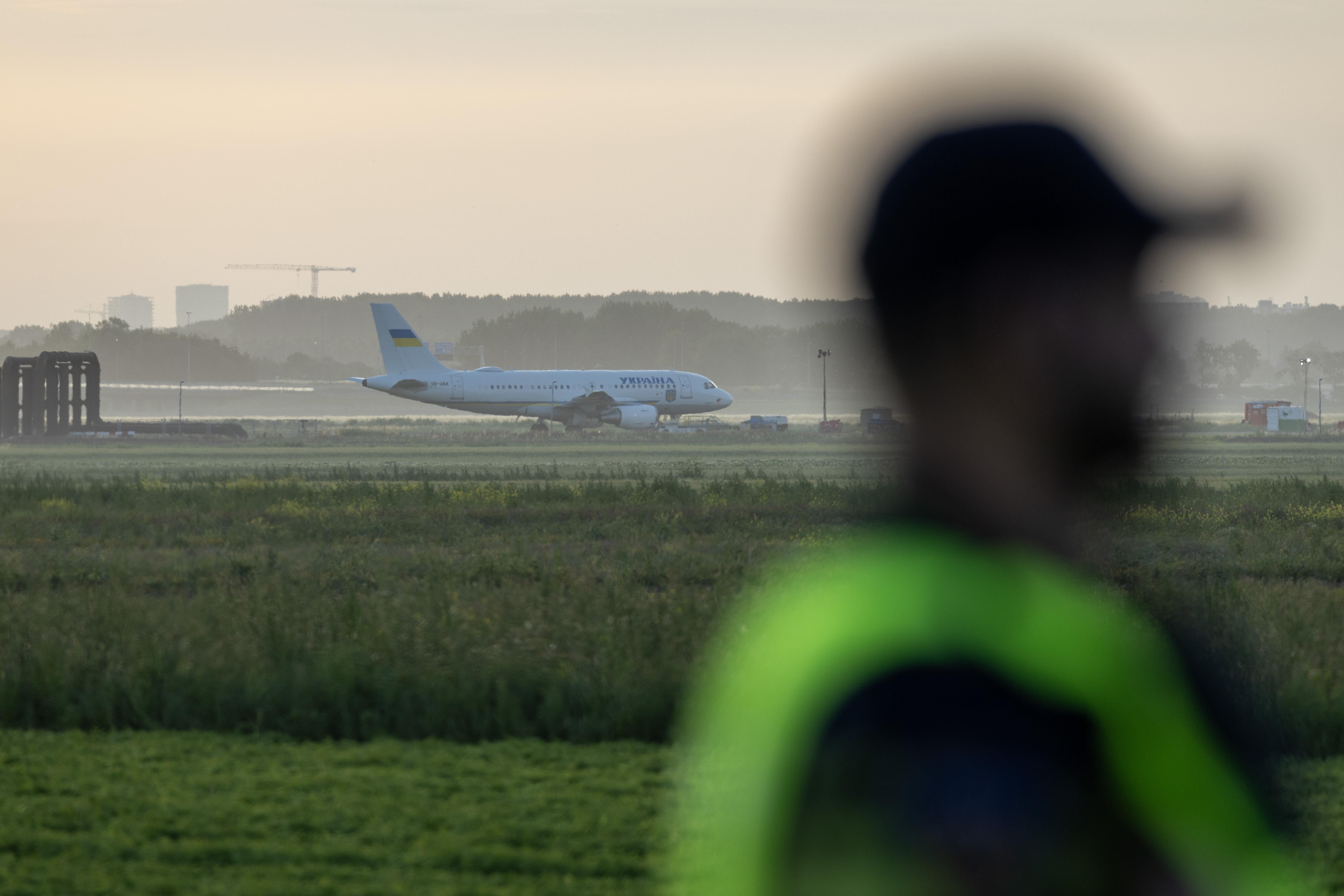 A plane from Ukraine is parked on the Polderbaan after arriving for the Nato summit at Amsterdam Airport Schiphol in Haarlemmermeer in the Netherlands
