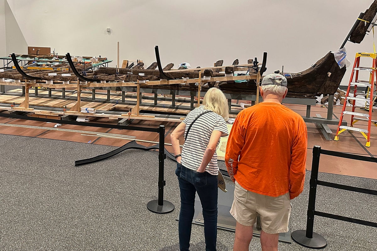 Workers digging at the World Trade Center site found a mystery boat. Now they’re rebuilding it