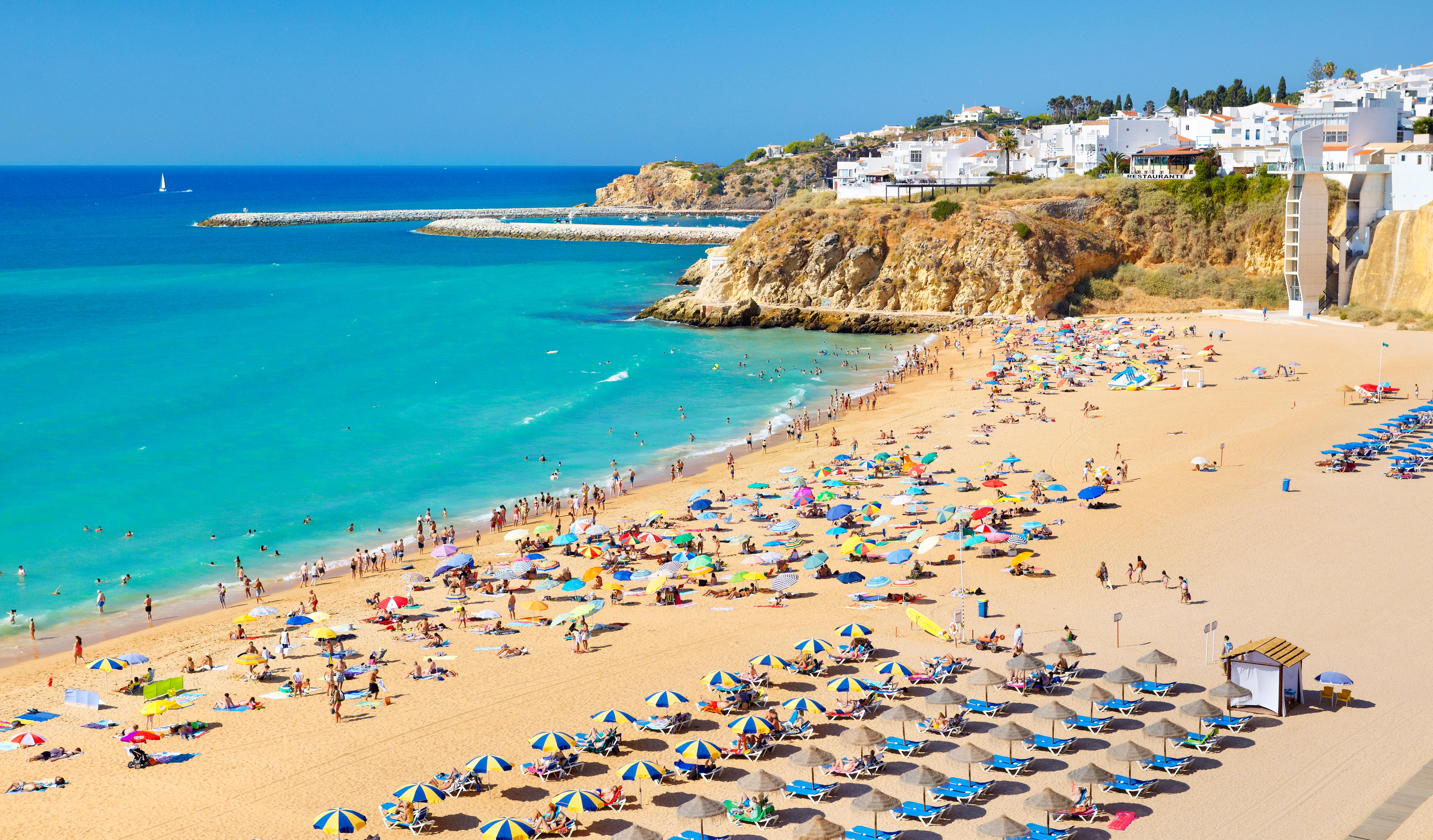 Enjoy stunning beaches with golden sands and crystalline waters in Portugal’s Algarve
