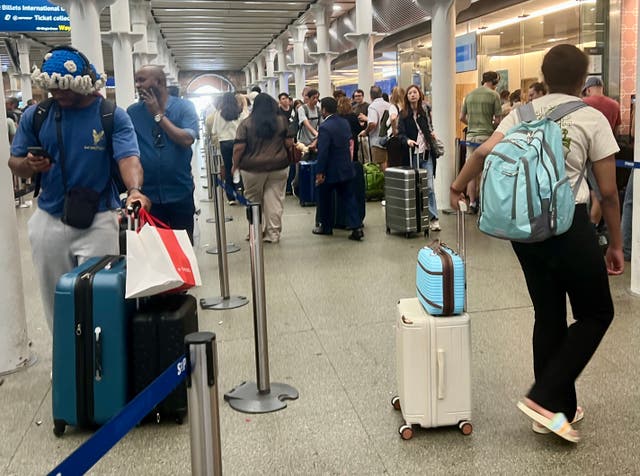 <p>Going places? Passengers queuing for the Eurostar service centre at London St Pancras International</p>