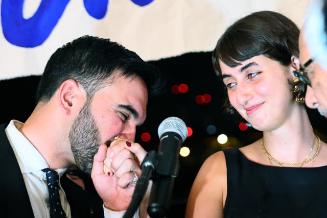 <p>New York mayoral candidate, State Rep. Zohran Mamdani (D-NY) kisses the hand of his wife Rama Duwaji after winning the primary</p>