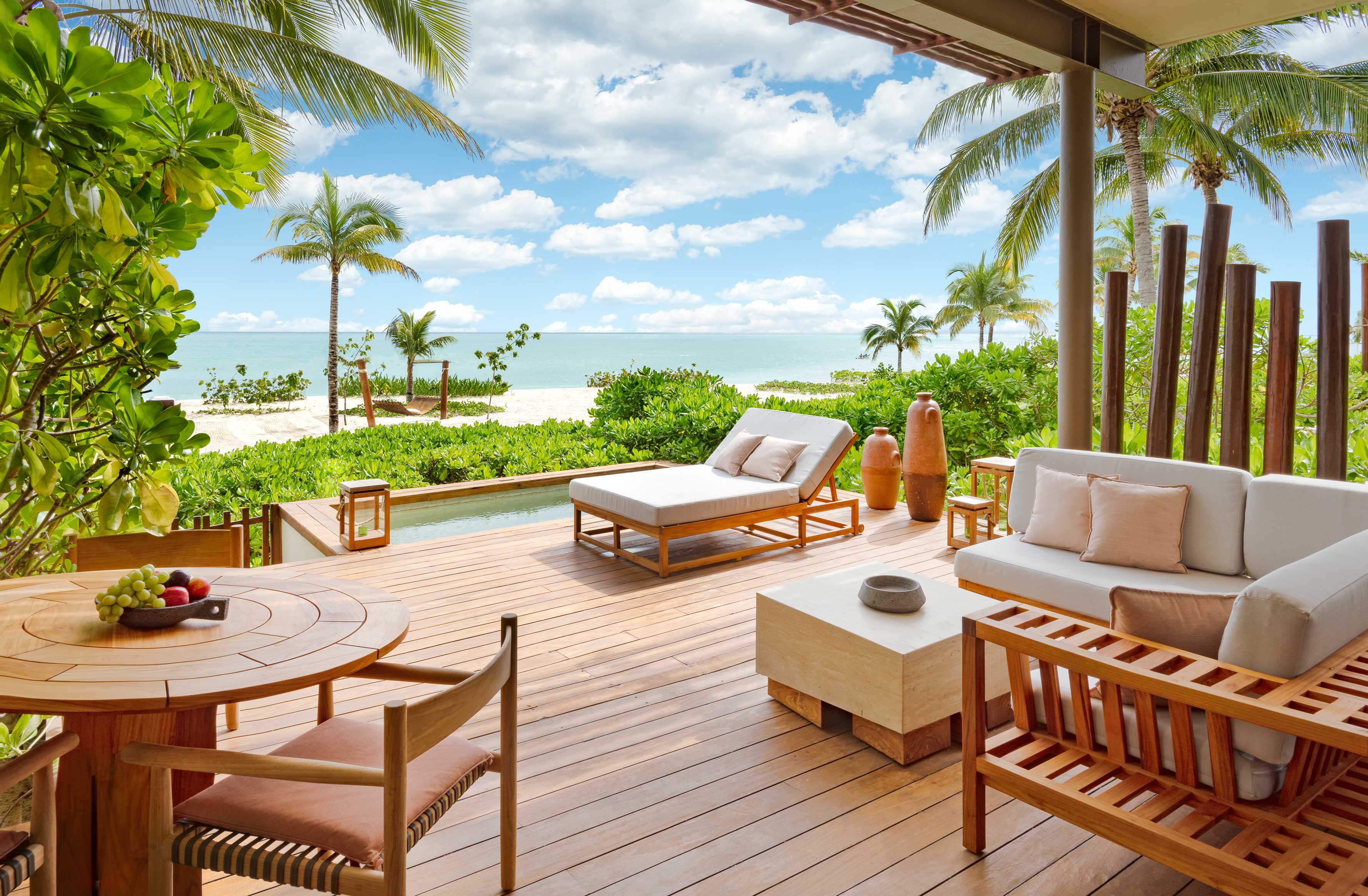 Check in via boat at Rosewood Mayakoba