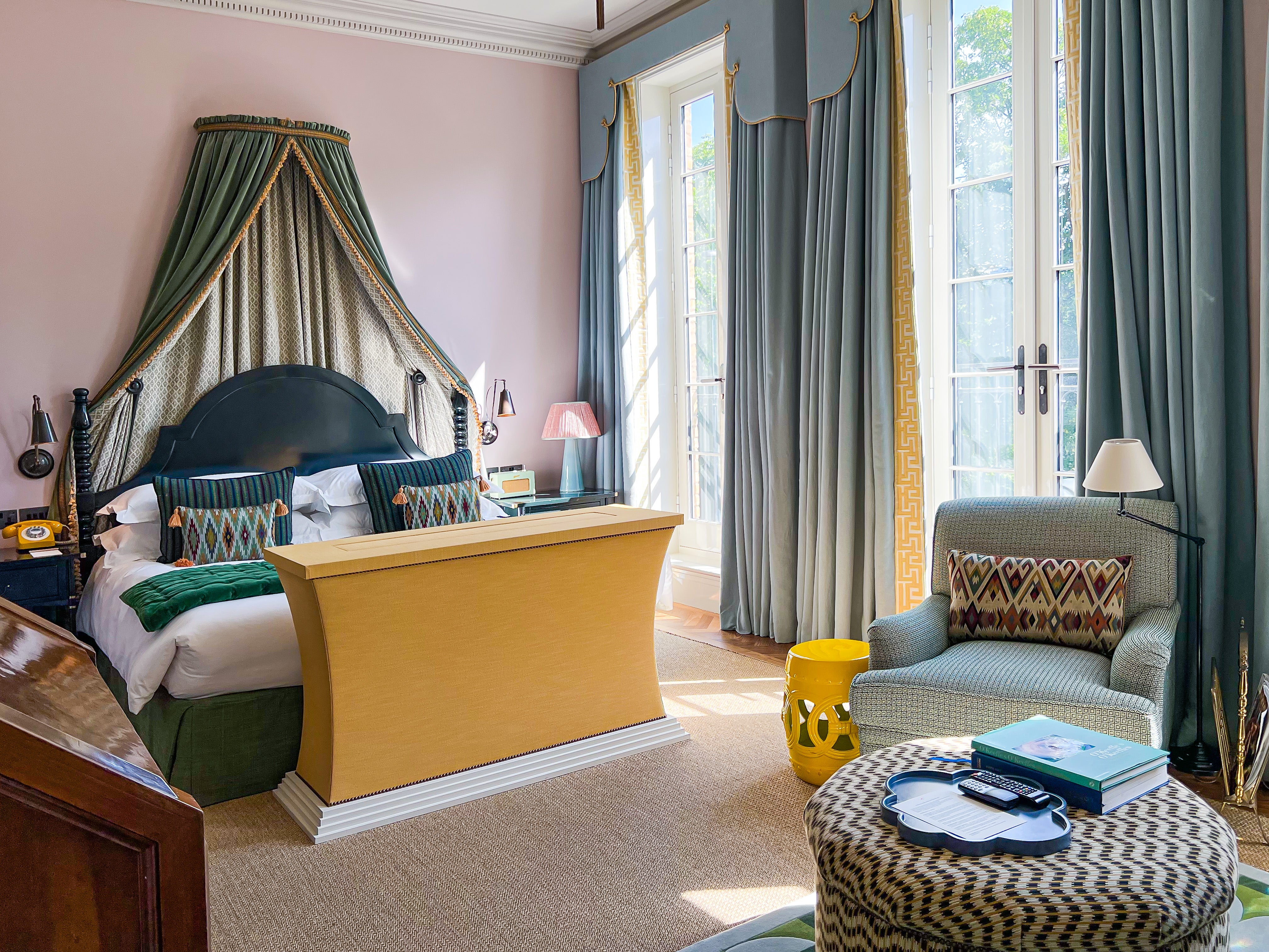 Stay tucked up all day, watching TV from the screen that pops out at the foot of the bed