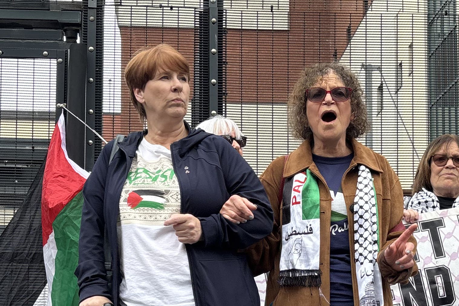 Martine McCullough and Sue Pentel outside Musgrave Street police station in Belfast (Rebecca Black/PA)