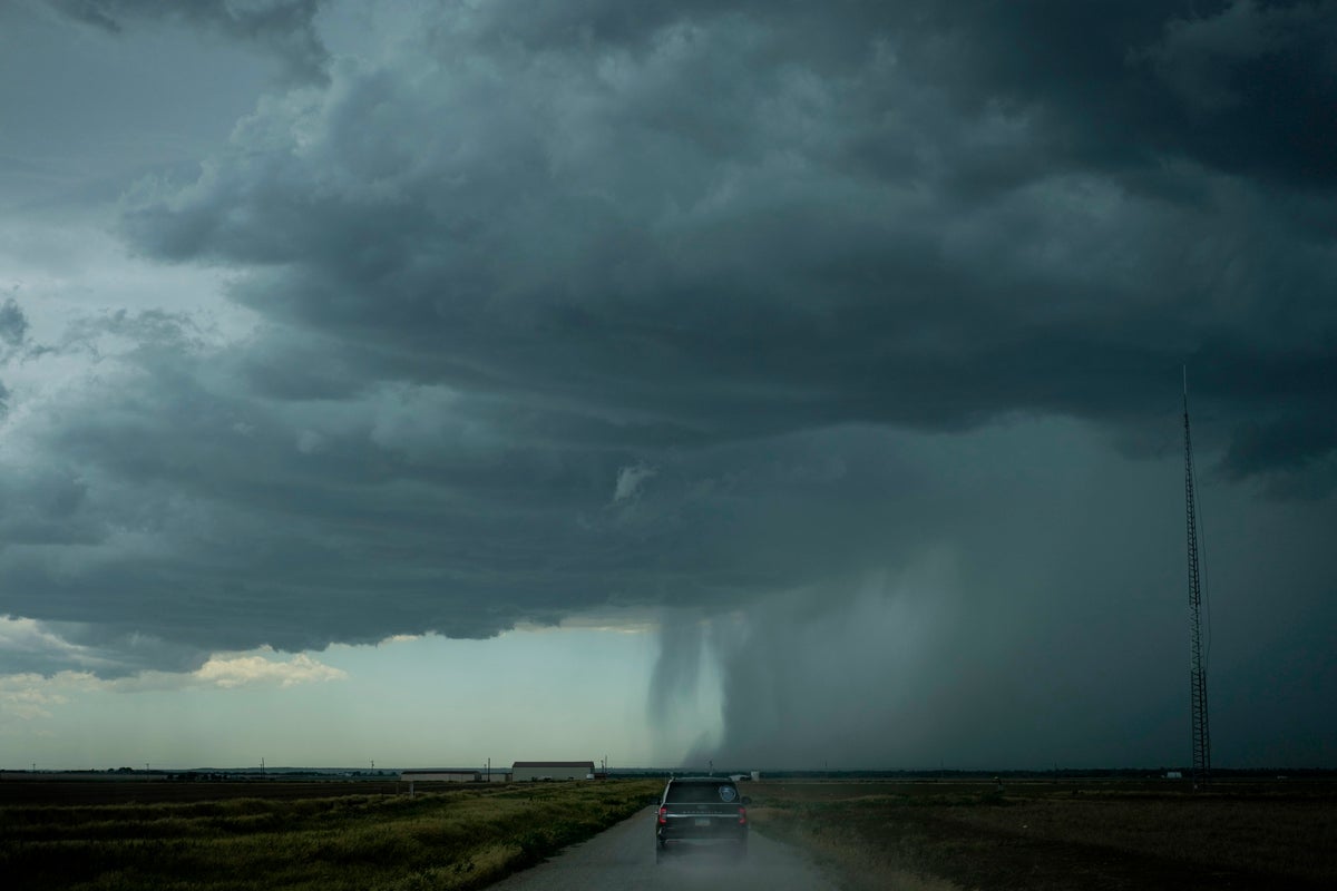 PHOTO ESSAY: Behind-the-scenes moments as hail chasers learn about pounding and costly storms