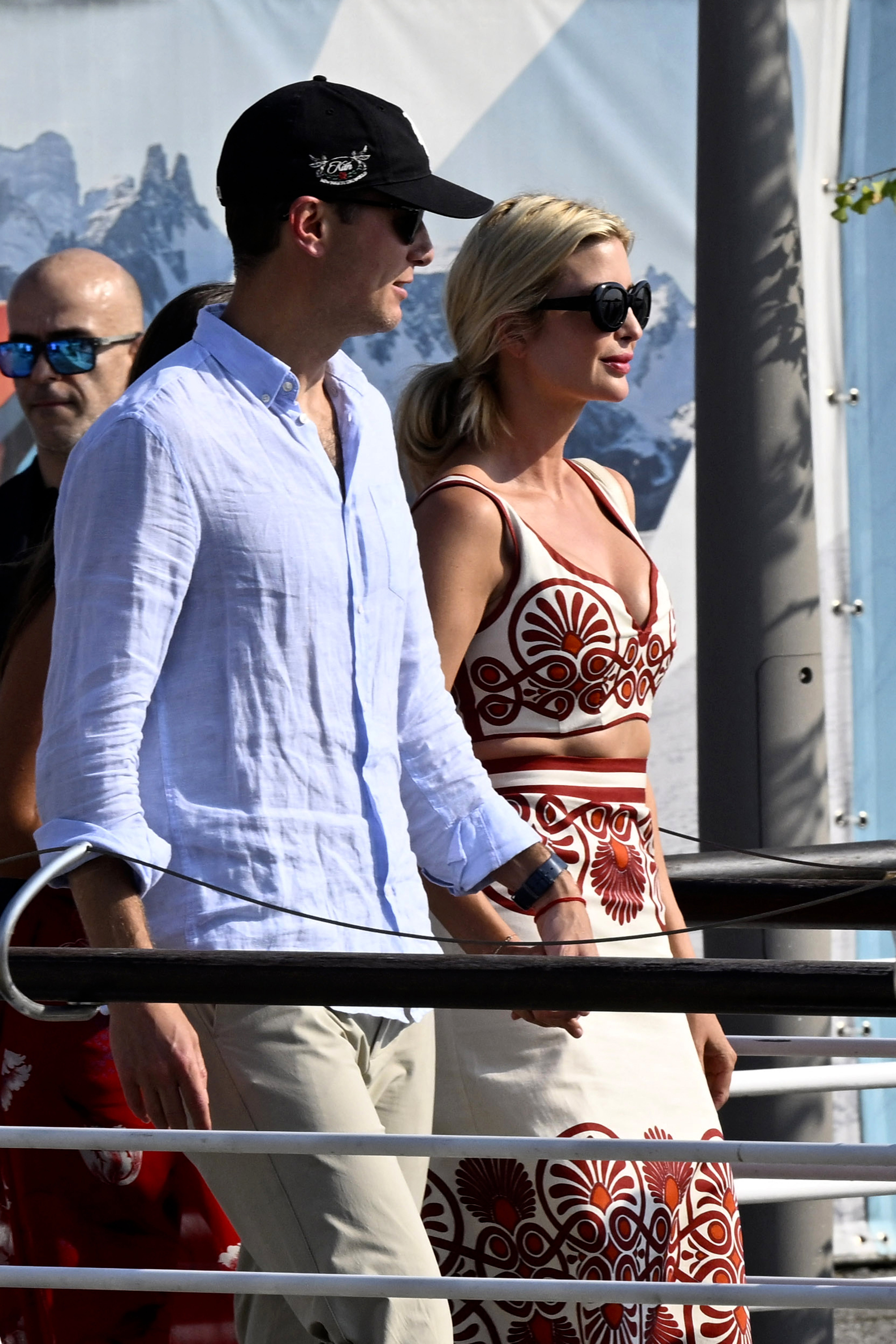 Ivanka Trump was one of the early arrivals in Venice alongside her husband, Jared Kushner. The daughter of Donald Trump wore a white tank top and skirt set, with a red floral pattern. She completed the look with black sunglasses