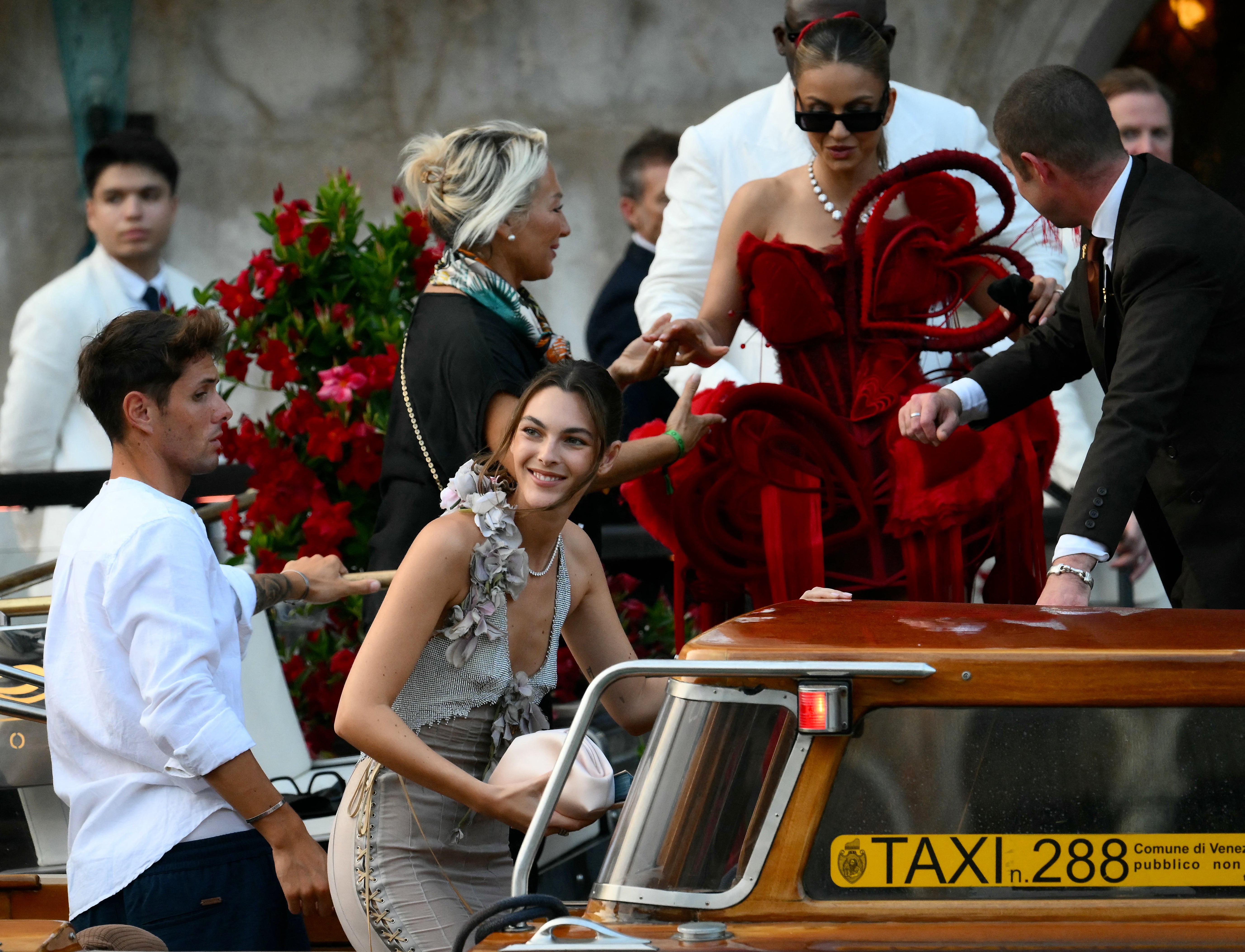Indian businesswoman Natasha Poonawalla wore a look that quite literally stood out. Her red corset dress was adorned with multiple giant hearts for the occasion