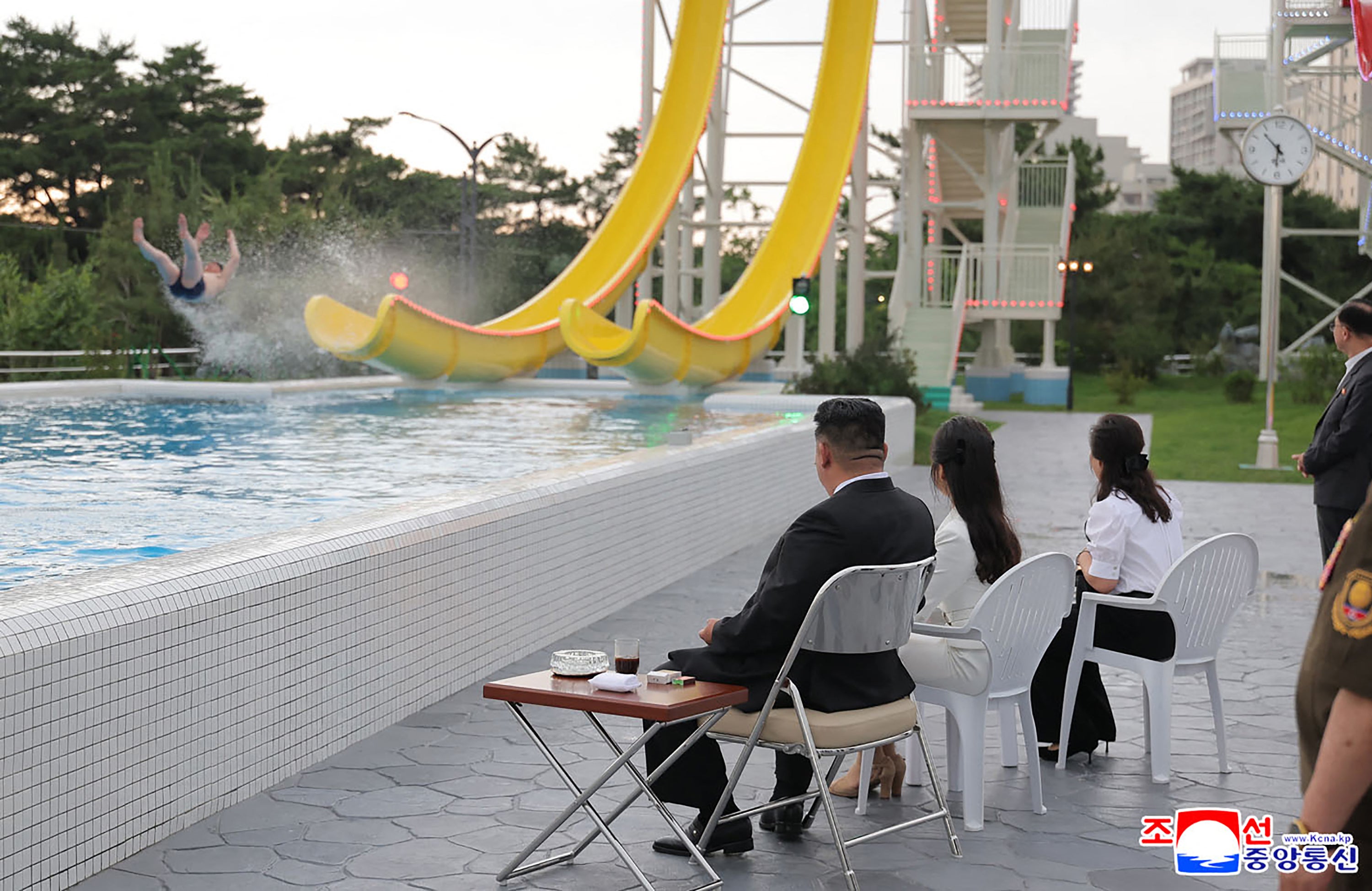 North Korean leader Kim Jong Un (L), his daughter Kim Ju Ae (2nd L) and his wife Ri Sol Ju (3rd L) visiting the Wonsan Kalma coastal tourist area in Kangwon Province, North Korea