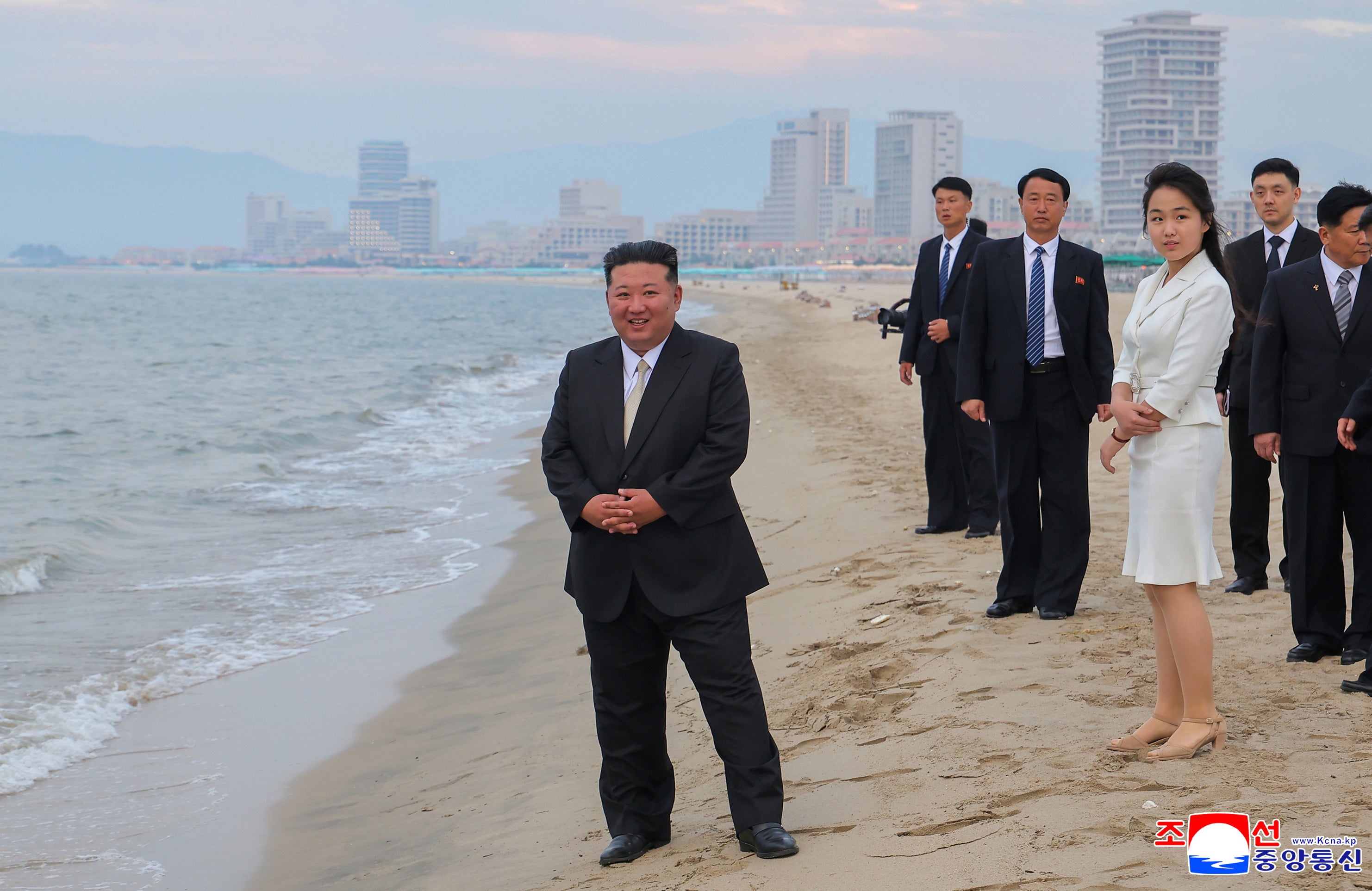 Kim Jong Un with his daughter on the 4km stretch of beach used for the resort