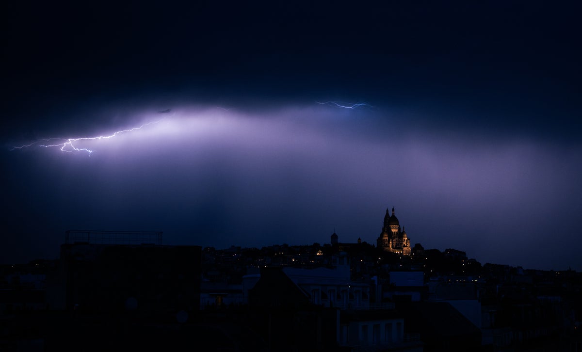 Deadly storms hit France as Paris streets flood and parliament springs a leak