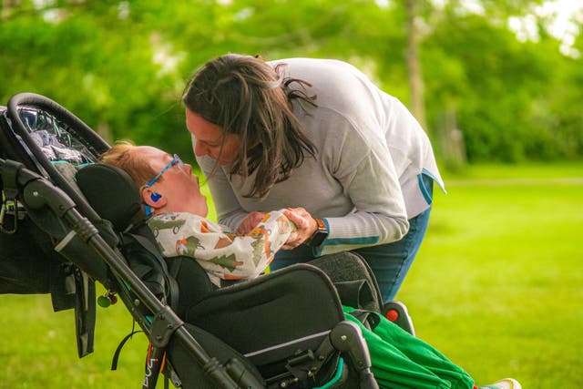 Laura and Archie McArthur say their local hospice has been with them ‘through it all’ (Ric Rawlins/Together for Short Lives/PA)