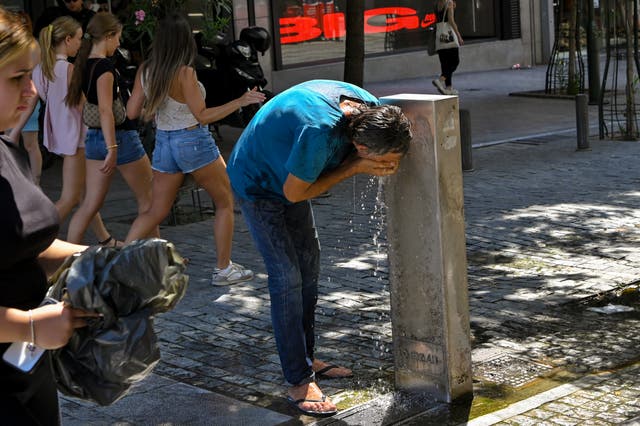 <p>A man refreshes with water on June 27, 2025 in Athens, Greece</p>