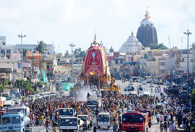 <p>File. Hindu devotees pull a chariot during Jagannath Rath Yatra in Puri on 12 July 2021</p>