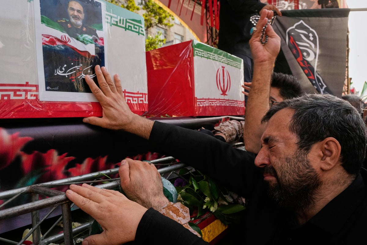 Photos of the funeral of top Iranian military commanders and scientists killed in Israeli strikes