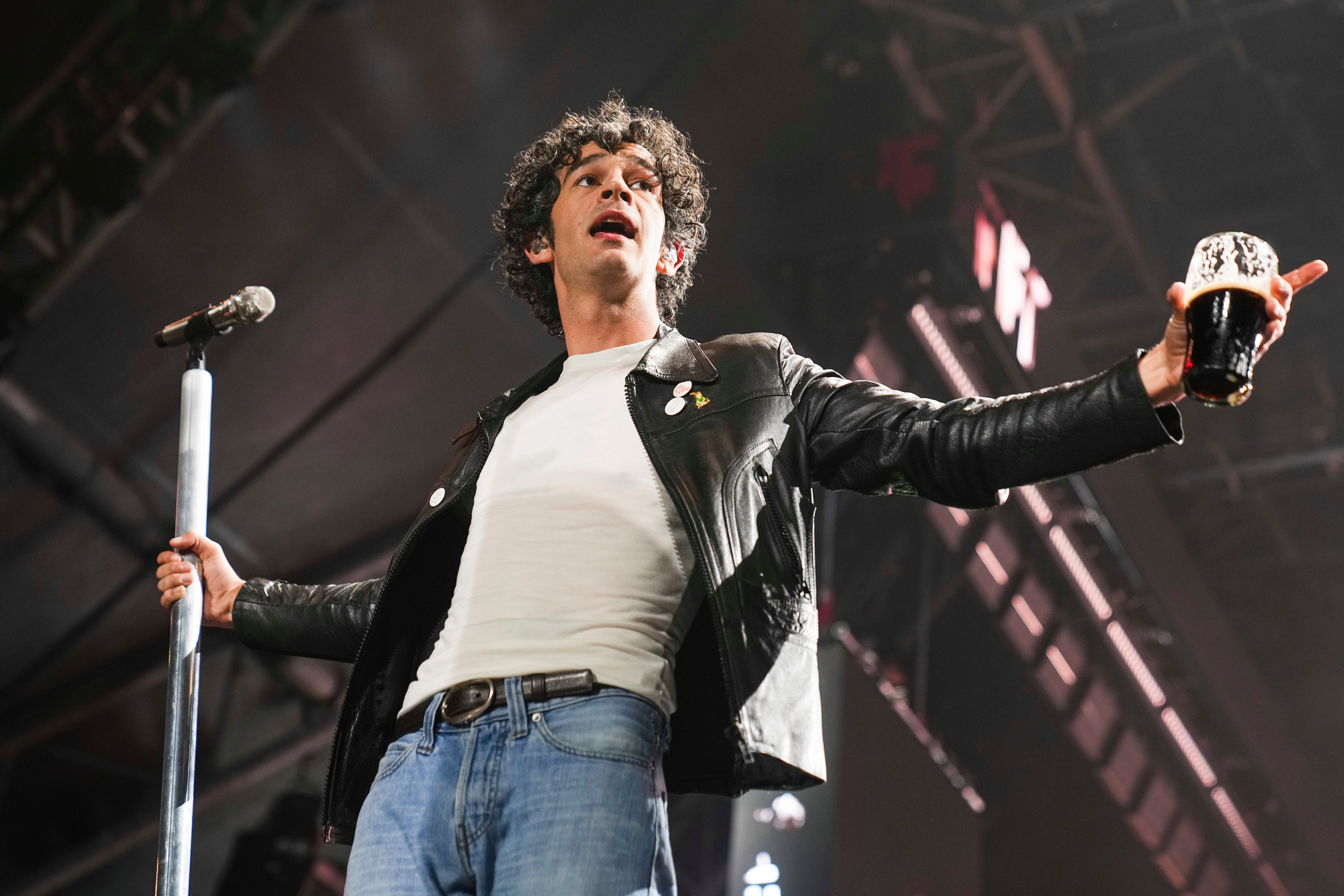 Matty Healy performing during The 1975’s headline set at Glastonbury 2025