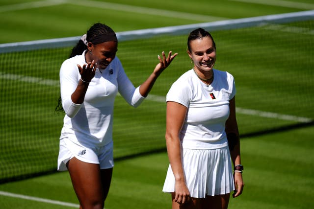 Aryna Sabalenka (right) and Coco Gauff (left) make Tik Toks together after practice at the All England Lawn Tennis and Croquet Club in Wimbledon ahead of the Wimbledon Championships (John Walton/PA)