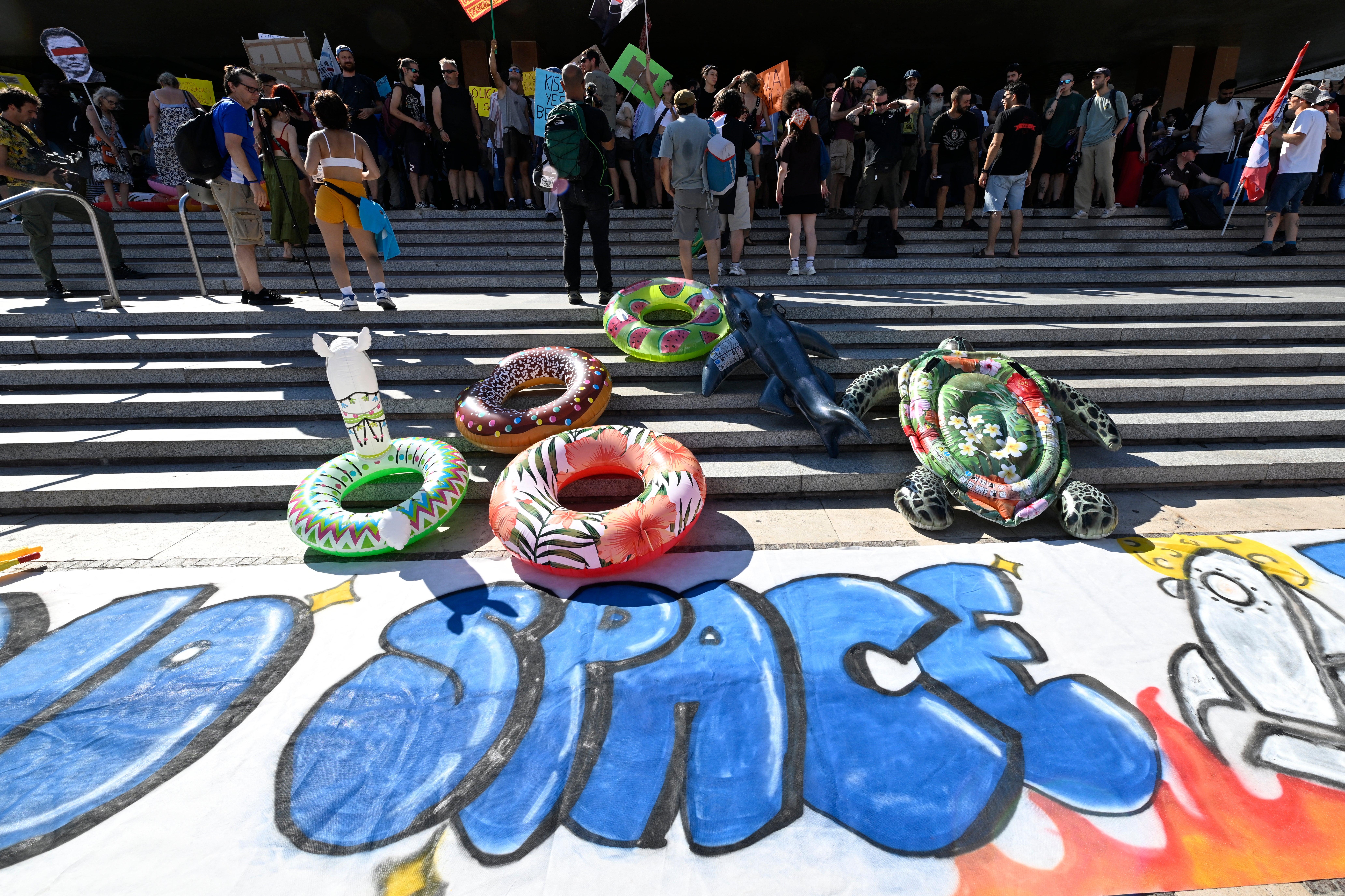 Locals continue to protest the lavish nuptials