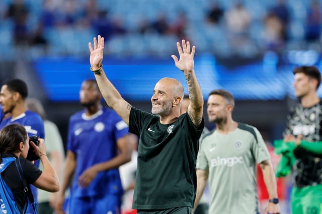 Chelsea coach Enzo Maresca waves to the crowd at the end of the match (Nell Redmond/AP)