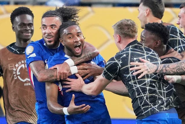Chelsea’s Christopher Nkunku is congratulated after scoring his team’s second goal (Chris Carlson/AP)