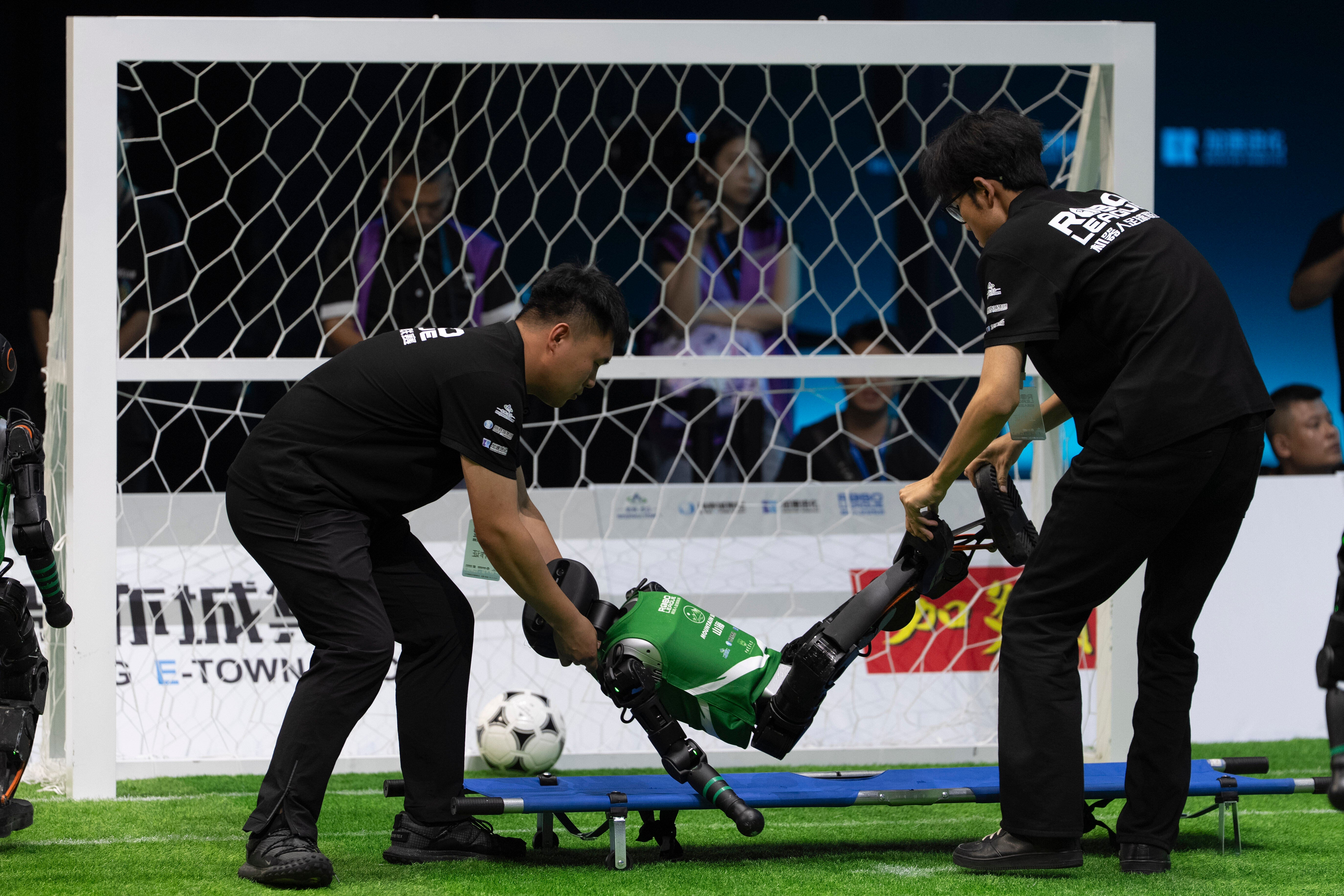 A robot is stretchered off during the event
