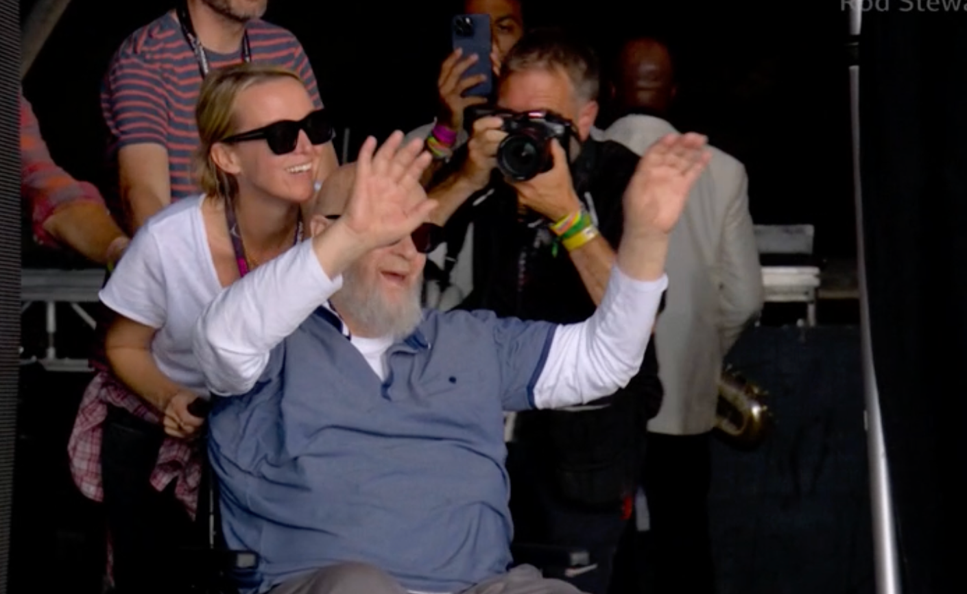 Emily Eavis bringing her father Michael onto stage for Rod Stewart's set