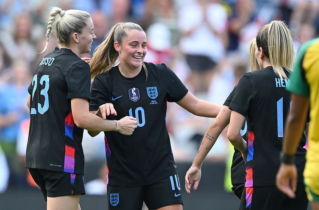 Ella Toone (centre) curled in England's third goal just before half time with her second