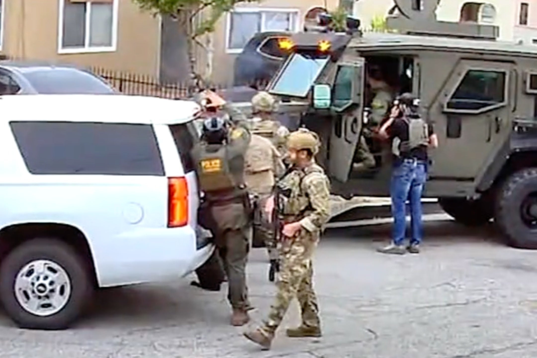 The Federal Agent has blew out the door from the suspect house in Huntington, California