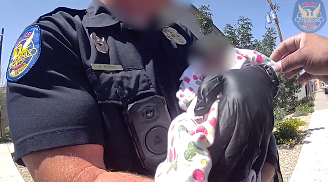 <p>Shocking police bodycam footage captured the moment Phoenix police officers saved an ‘emaciated’ baby whose mother had died in the home </p>