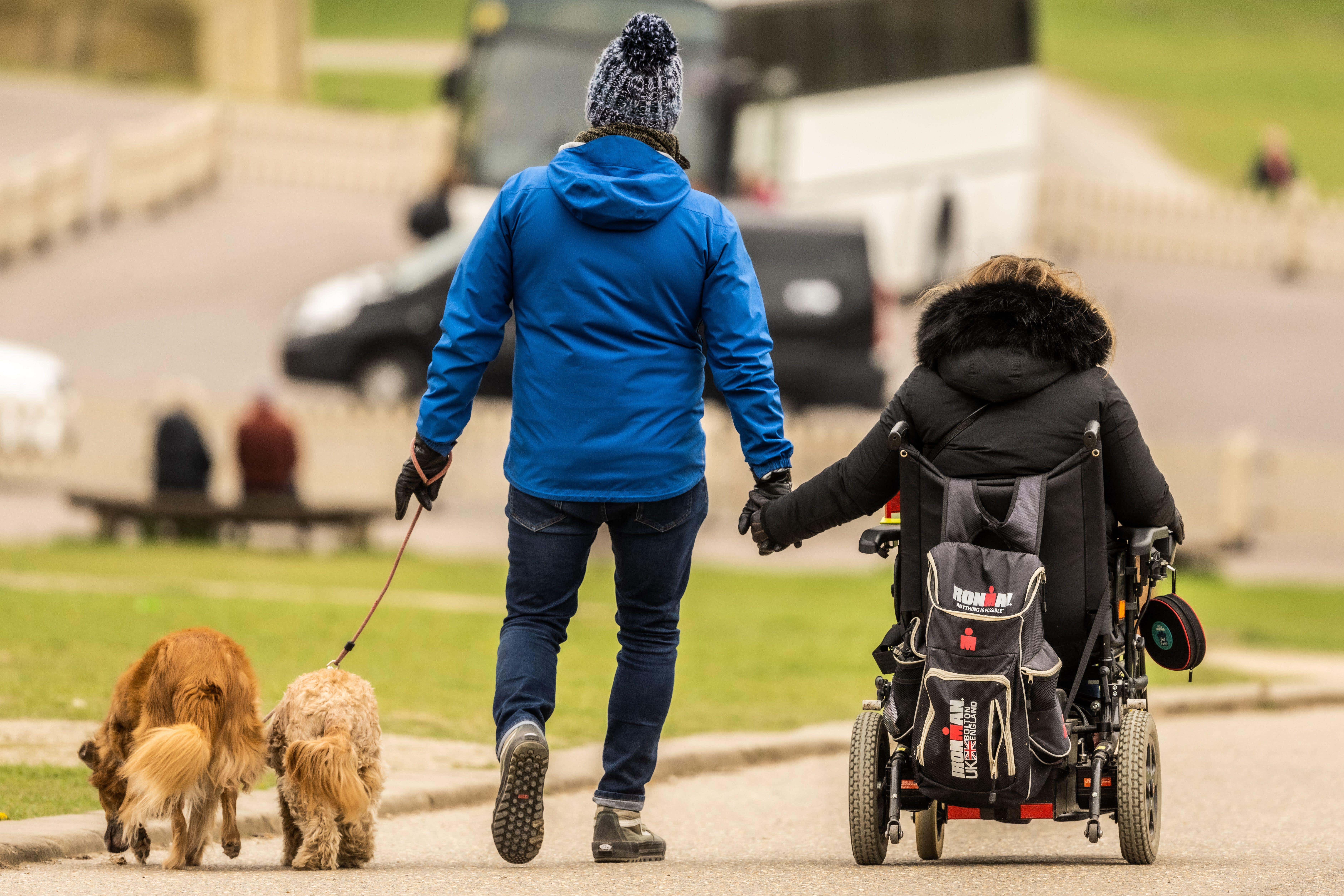 A new report has suggested extra annual costs for disabled people could rise to almost £15,000 by the end of the decade (Alamy/PA)