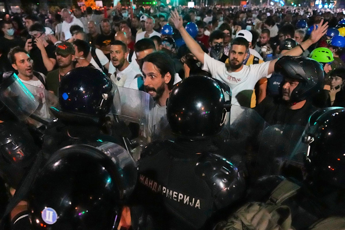 Serbian police remove street blockades in Belgrade and make new arrests as tensions persist