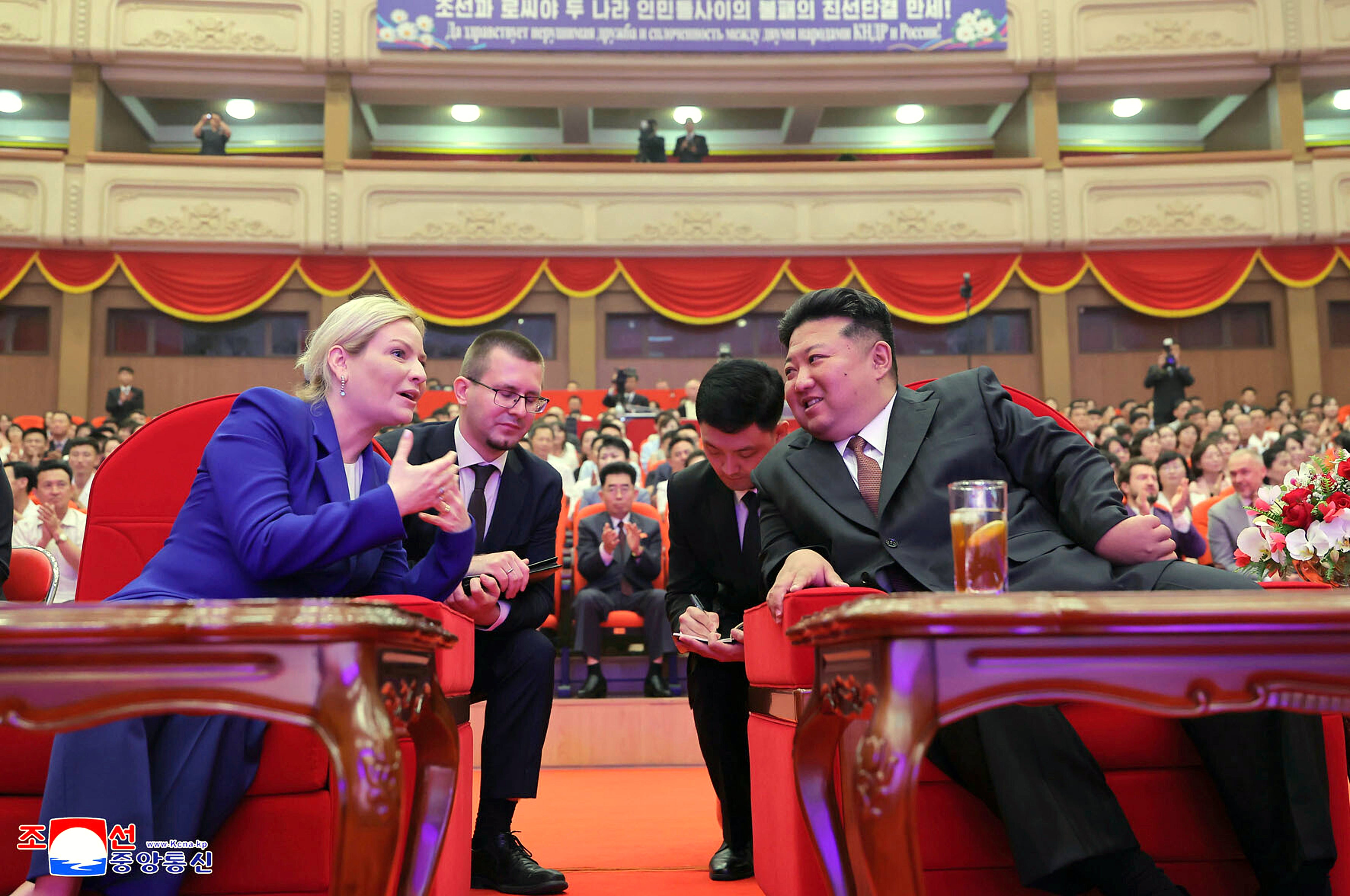North Korean leader Kim Jong Un, front right, and Russian Minister of the Culture Olga Lyubimova, front left, watch performance by Russian and North Korean artists at the East Pyongyang Grand Theatre in Pyongyang