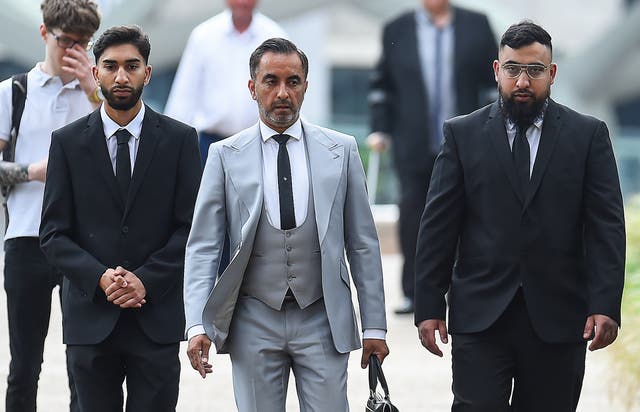 <p>From left: Mohammed Fahir Amaaz, lawyer Aamer Anwar and Muhammad Amaad arrive at Liverpool Crown Court on Friday</p>