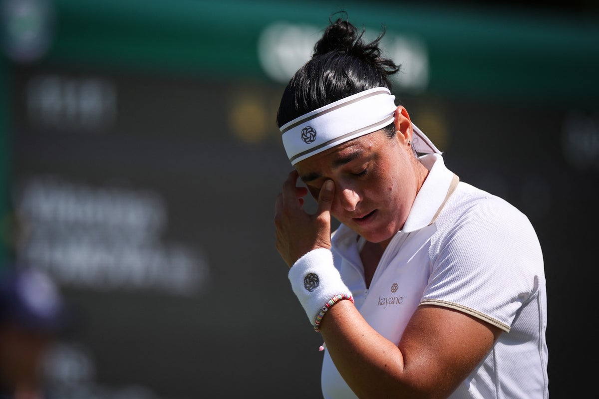Tearful Ons Jabeur retires at Wimbledon through injury Tearful Ons Jabeur retires at Wimbledon through injury