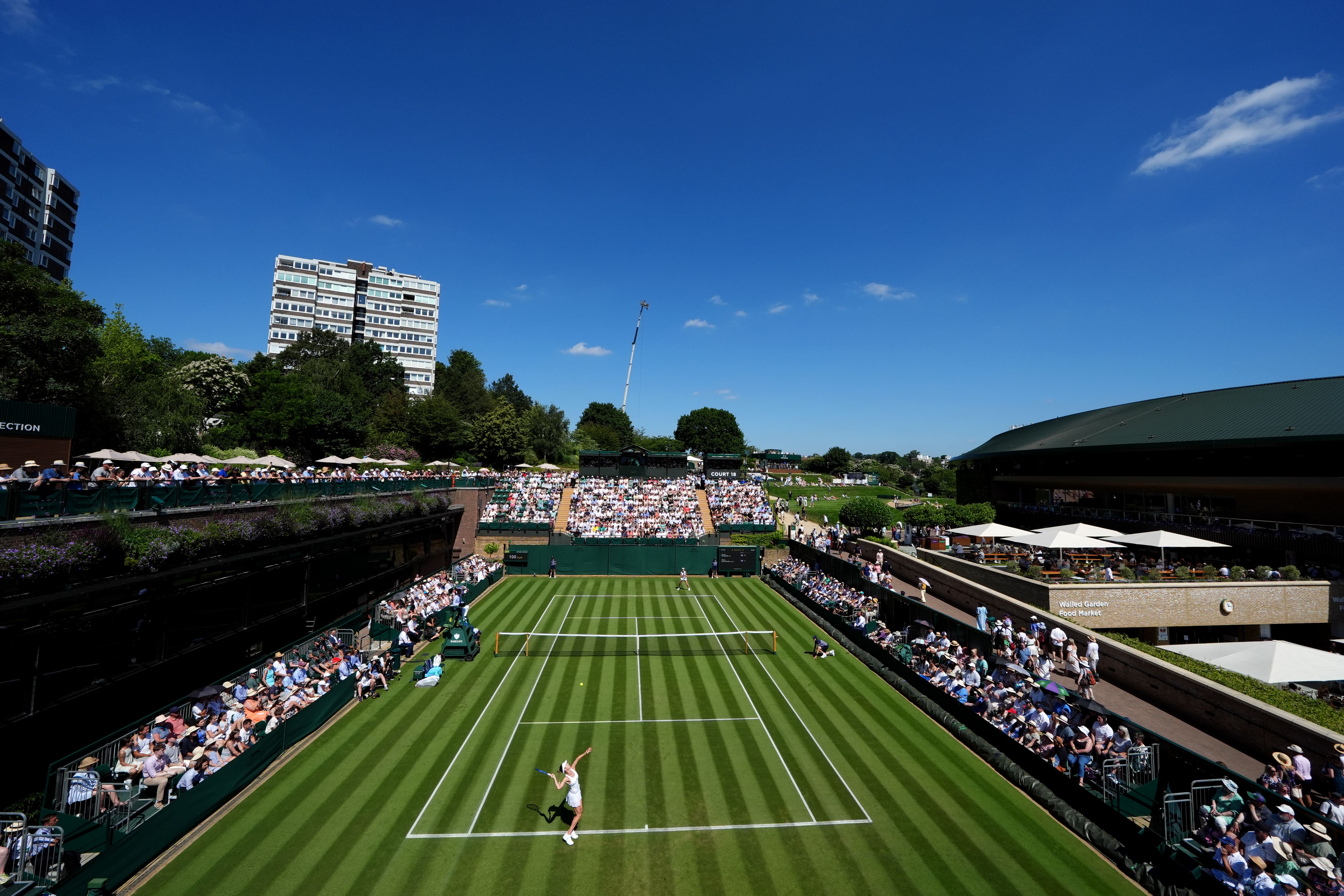 Anna Bondar serves during her match against Elina Svitolina on day one of the 2025 Wimbledon Championships (John Walton/PA)