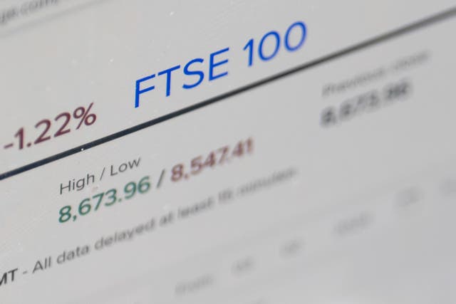 The FTSE 100 index closed down 37.95 points, 0.4%, at 8,760.96 (PA)