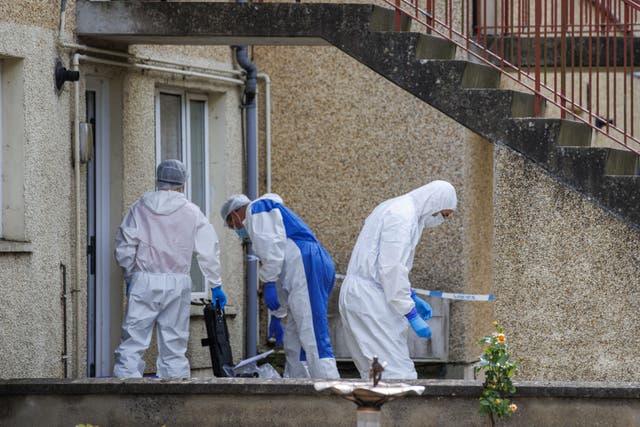 Police Service of Northern Ireland (PSNI) scene of crime officers (SOCO) in the Elmfield Walk area of Donaghadee, Co Down (Liam McBurney/PA)