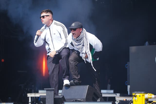 <p>Kneecap performing on the West Holts Stage at Glastonbury</p>