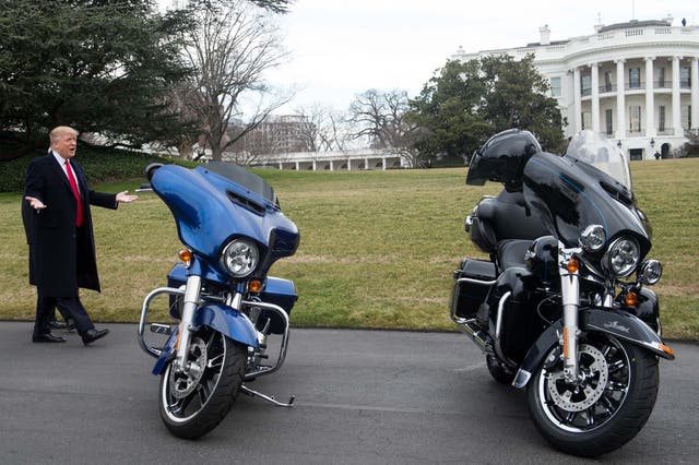 <p>South Dakota Sen. Rounds invited Trump to attend the annual Sturgis Motorcycle Rally, saying the president would ‘be impressed with the reception.’ Pictured: Trump with motorcycles during his first term.</p>