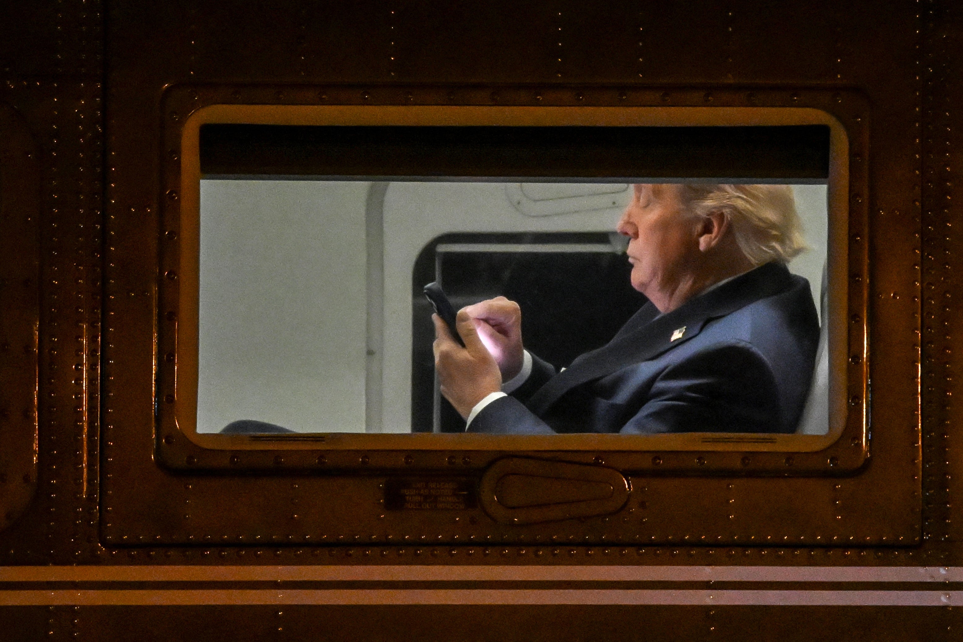 President Donald Trump blamed the telecom company AT&T for causing delays on a conference call on Monday