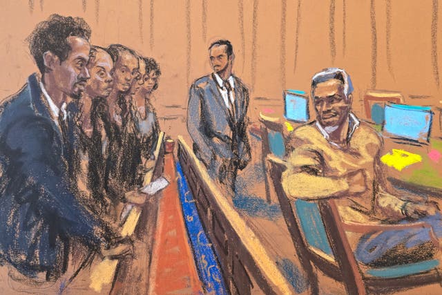 <p>Sean ‘Diddy’ Combs turns towards his family standing at midday, during his sex trafficking trial in New York City on June 30</p>