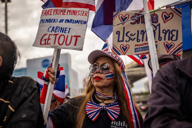 <p>Protesters rally in front of Victory Monument on 28 June 2025 in Bangkok, Thailand. Thousands of protesters gathered at Bangkok's Victory Monument to demand prime minister Paetongtarn Shinawatra resign over a leaked phone call linked to a border dispute with Cambodia</p>