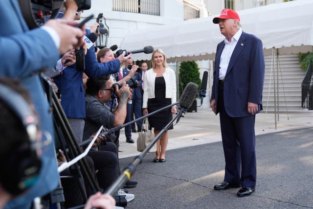 <p>Trump speaks to reporters outside the White House before departing for a visit to Florida on July 1</p>